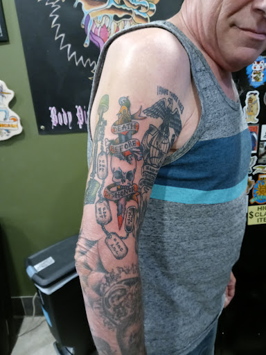 Tattoo Shop «Mutiny Tattoo and Piercing», reviews and photos, 5609 Chicago Ave, Minneapolis, MN 55417, USA