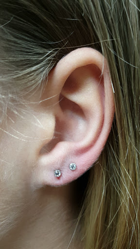 Explore dark hand tattoo ideas, creative tattoo ideas in Aurora, available at Ronin Tattoo Studio INC