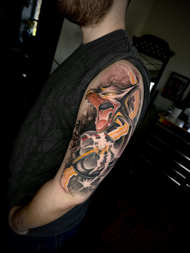 Explore lower belly tattoo ideas, creative tattoo ideas in Southampton, available at Le Uke Tattoo Studio