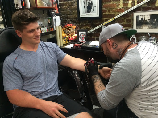 Explore tattoo ideas for writers, creative tattoo ideas in Boston, available at Boston Barber & Tattoo Co.