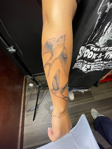 Explore dinosaur tattoo ideas, creative tattoo ideas in Orange Park, available at Big City Tattoo and Piercing