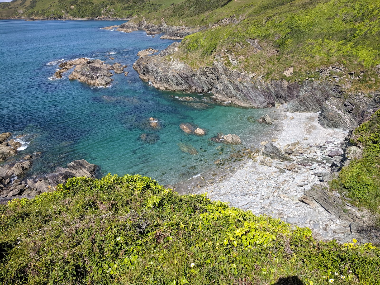 Photo of Parsons Cove with turquoise pure water surface
