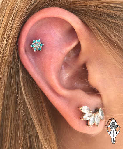 Find tattoos in between breast ideas for your next unique tattoo in El Paso at Fox Labyrinth Body Piercing and Fine Jewelry