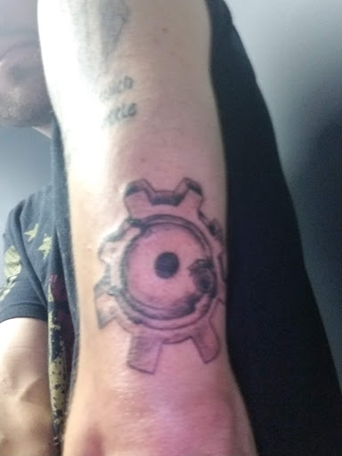 Explore back tattoo ideas for men, creative tattoo ideas in Athens, available at United Ink Tattoos and Body Piercings