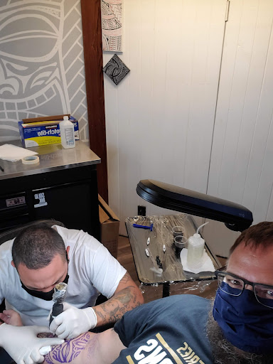 Explore 2001 tattoo ideas, creative tattoo ideas in Kailua Kona, available at Lady Luck Tattoo & Body Piercing