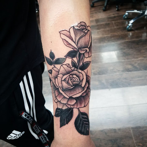 Explore unique tramp stamp tattoo ideas, creative tattoo ideas in San Diego, available at Funhouse Tattoo