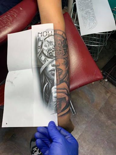 Explore cross tattoo ideas for women, creative tattoo ideas in Great Falls, available at Alpha Tattoos & Piercings