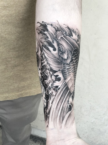 Explore iowa hawkeye tattoo ideas, creative tattoo ideas in Los Angeles, available at Hailin Tattoo Studio