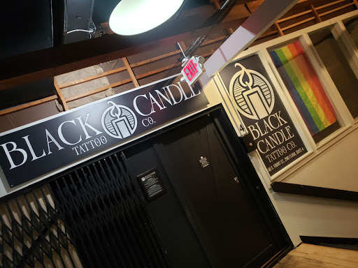 Explore snoopy tattoo ideas, creative tattoo ideas in Traverse City, available at Black Candle Tattoo Co.