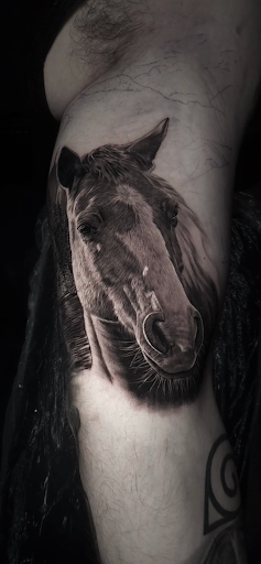 Explore men's back tattoos ideas, creative tattoo ideas in Hollywood, available at Sacred Eye Tattoos