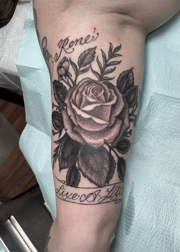 Find angel hand tattoo ideas for your next unique tattoo in Thousand Oaks at Dire Wolf Tattoo and Fine Art