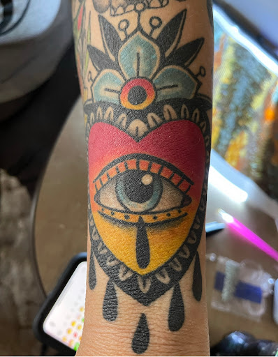 Explore photography tattoo ideas, creative tattoo ideas in Bullhead City, available at Smoke and Dagger Tattoo