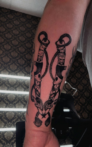 Explore sexy tattoo ideas for guys, creative tattoo ideas in North Tonawanda, available at Dark Side Ink Tattoo Studio