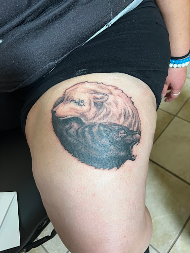 Explore kiss tattoo ideas, creative tattoo ideas in Las Cruces, available at Real INX Fine Art- Tattoo Piercing & Art Studio