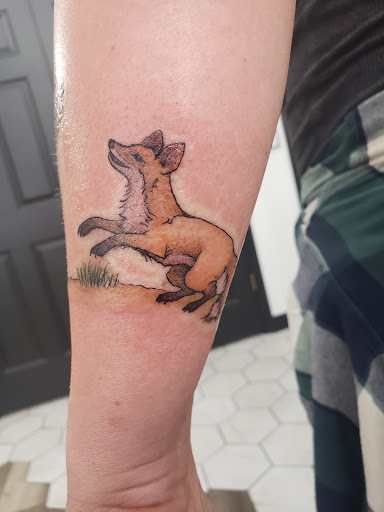 Explore small fishing tattoo ideas, creative tattoo ideas in Logan, available at The White Wasp Tattoo Studio