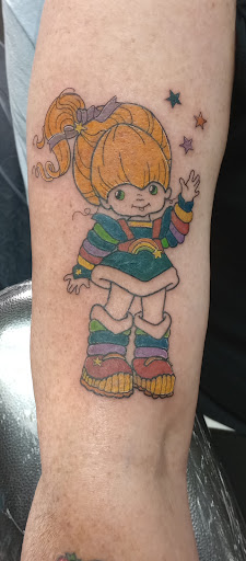 Explore father tattoo ideas for daughter, creative tattoo ideas in Huntington, available at Golden Dagger Tattoos and Piercings