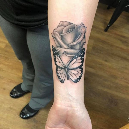 Find female rib tattoo ideas for your next unique tattoo in Canton at Couture Tattoo and Body Piercing