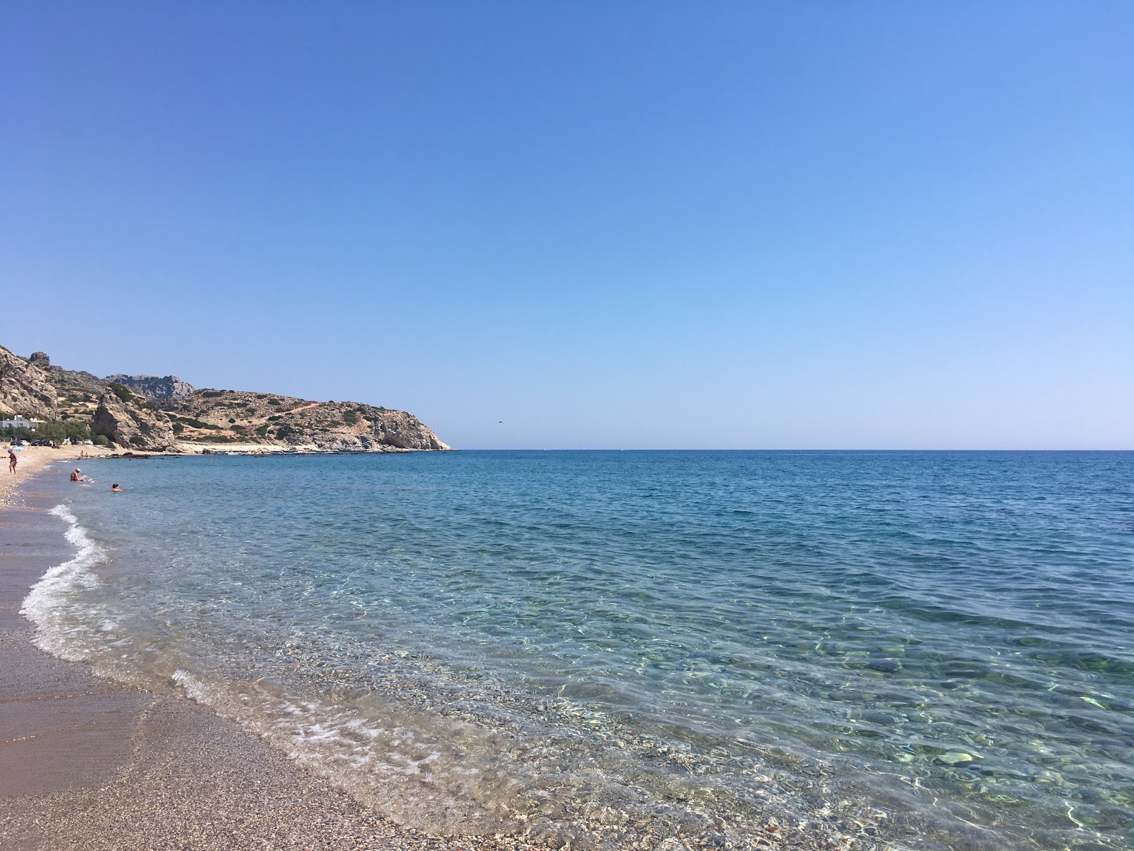 Foto von Stegna beach und die siedlung