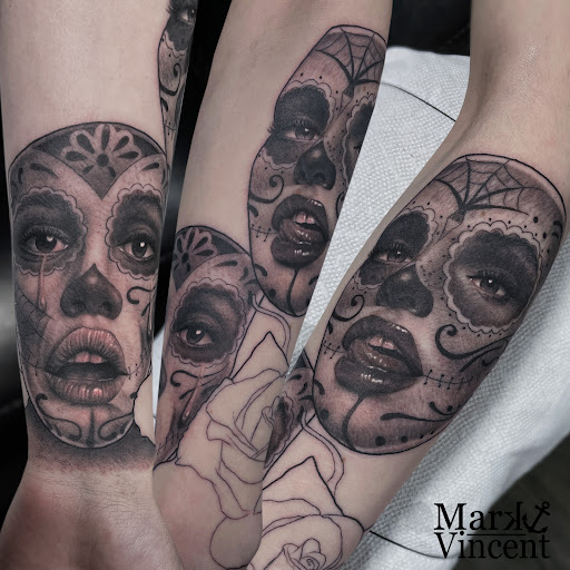 Explore kiss tattoo ideas, creative tattoo ideas in Downingtown, available at Iconic Tattoo Co