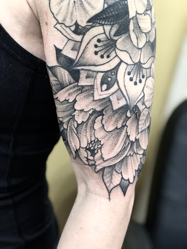 Explore ideas for elbow tattoos, creative tattoo ideas in Orange, available at North Quabbin Tattoo