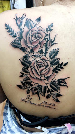 Tattoo Shop «Consolidated Tattoo», reviews and photos, 107 W Kearsley St, Flint, MI 48502, USA