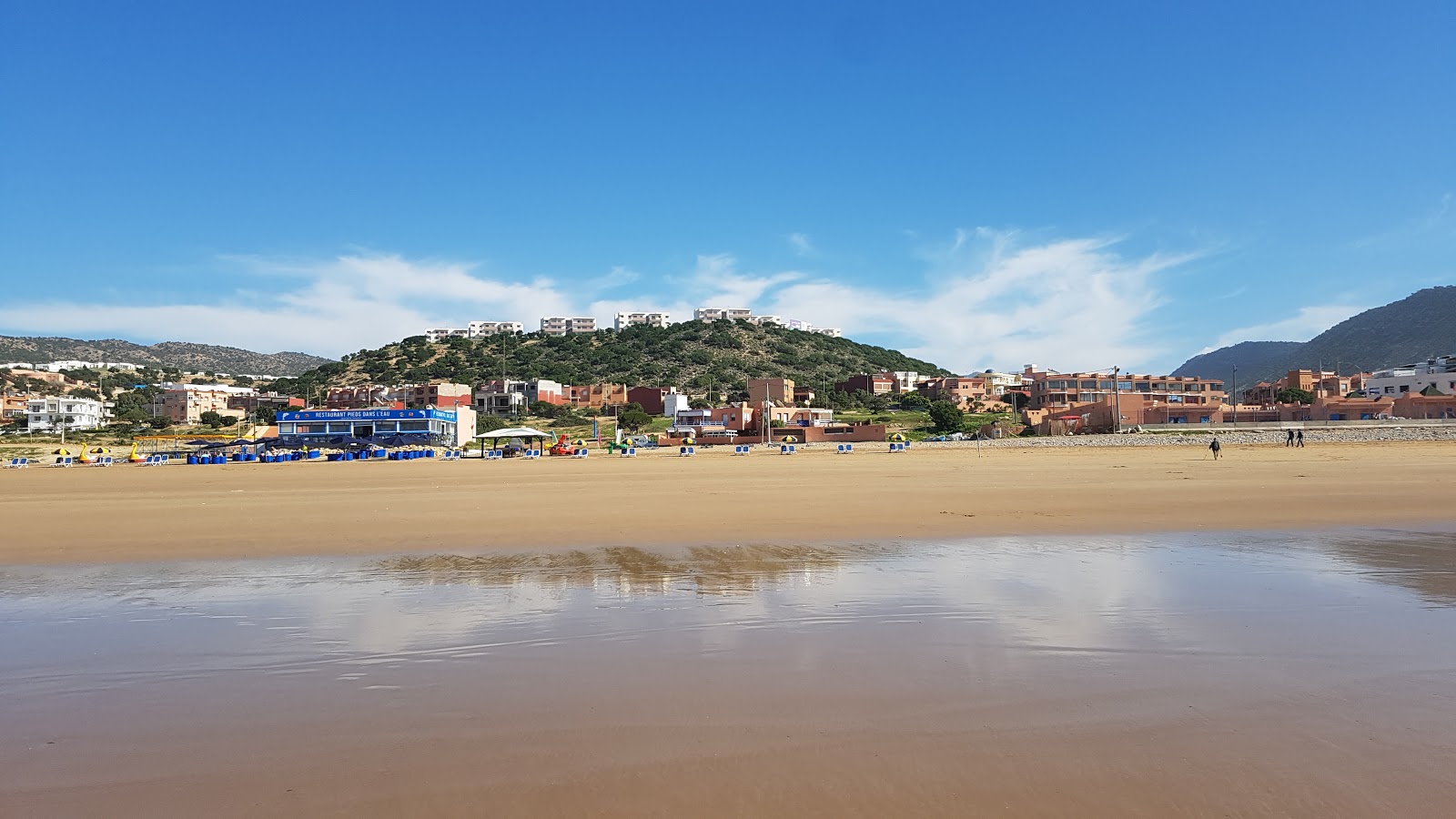 Foto van Plage Aghroud ondersteund door kliffen