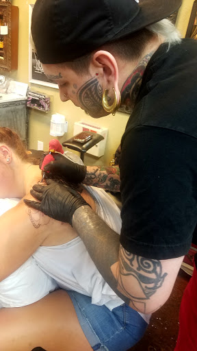 Explore male foot tattoo ideas, creative tattoo ideas in Rockford, available at Delicious Ink Tattoo & Piercing