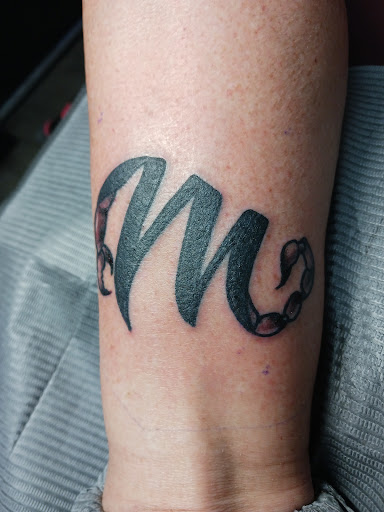 Explore bass fishing tattoo ideas, creative tattoo ideas in College Station, available at Legacy Tattoo Lounge