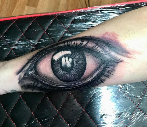 Explore nail technician tattoo ideas, creative tattoo ideas in Scott City, available at Distinked Art and Tattoo