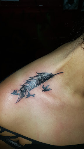 Explore to the moon and back tattoo ideas, creative tattoo ideas in Los Angeles, available at South Central Tattoos