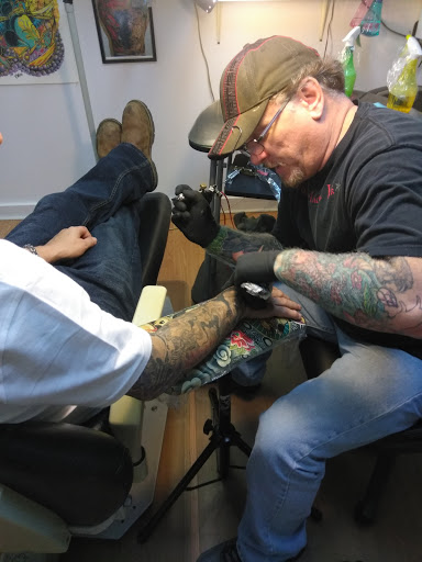 Explore growth tattoo ideas, creative tattoo ideas in Anniston, available at Artistic Addictions