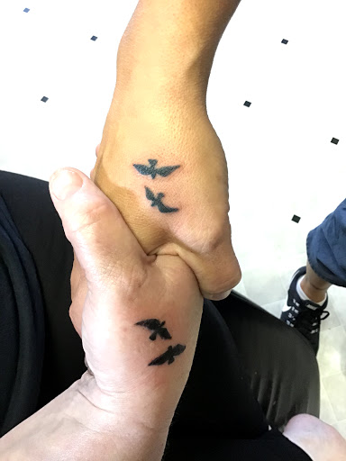 Explore mens cross tattoo ideas, creative tattoo ideas in Stuart, available at Urban Inkers Tattoos
