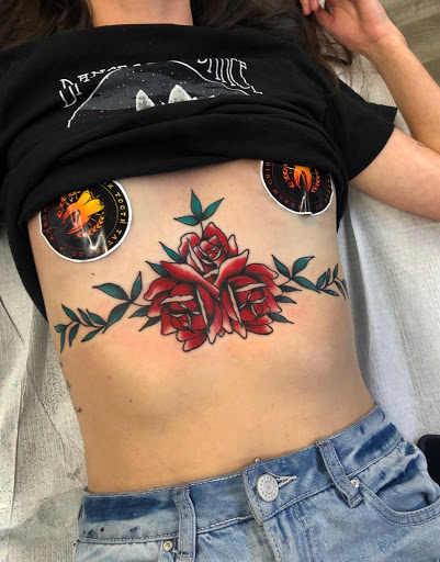 Explore tribal chest tattoo ideas, creative tattoo ideas in Johnson City, available at Gold Cross Tattoo Co.