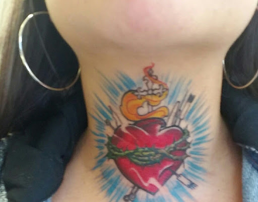 Explore unique tramp stamp tattoo ideas, creative tattoo ideas in Morgan Hill, available at ART OF THE HEART TATTOO & PIERCINGS