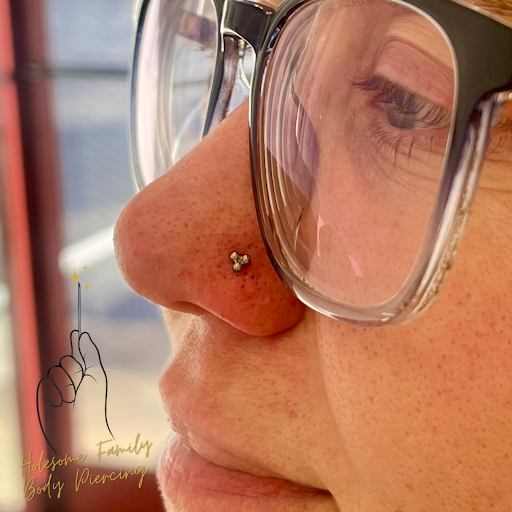 Explore back shoulder tattoo ideas for men, creative tattoo ideas in Seneca, available at Holesome Family Body Piercing