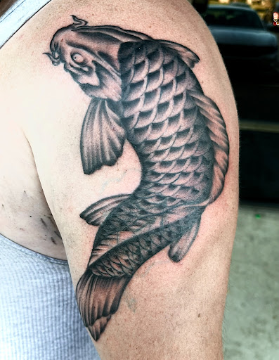 Explore male wedding ring tattoo ideas, creative tattoo ideas in Webster, available at Mainline Ink
