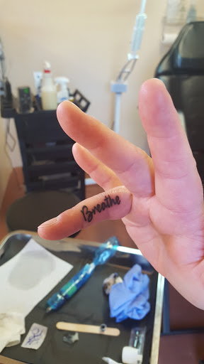 Explore tattoo ideas hand wrist, creative tattoo ideas in Traverse City, available at Pinups & Needles