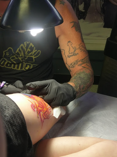 Explore minimalist dog tattoo ideas, creative tattoo ideas in Santa Fe, available at The G Spot (I.P.Ink)