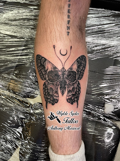 Explore back neck tattoo ideas, creative tattoo ideas in San Diego, available at Wylde Sydes Tattoo & Body Piercing