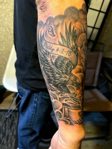 Explore 2 face tattoo ideas, creative tattoo ideas in Milford, available at Golden Hammer Tattoo Studios