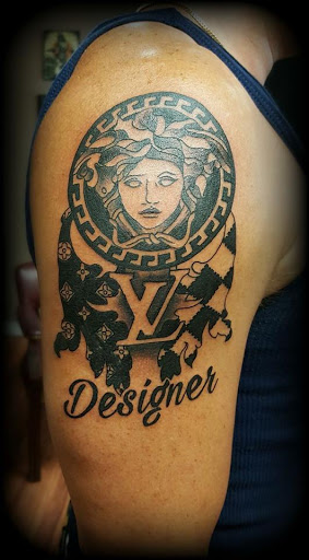 Explore scroll tattoo ideas, creative tattoo ideas in Harrison, available at Flying Monkey Tattoo Parlour