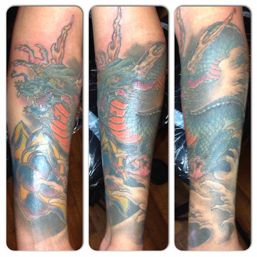 Find family symbol tattoo ideas for your next unique tattoo in Ithaca at Artistic Point Tattoo Company