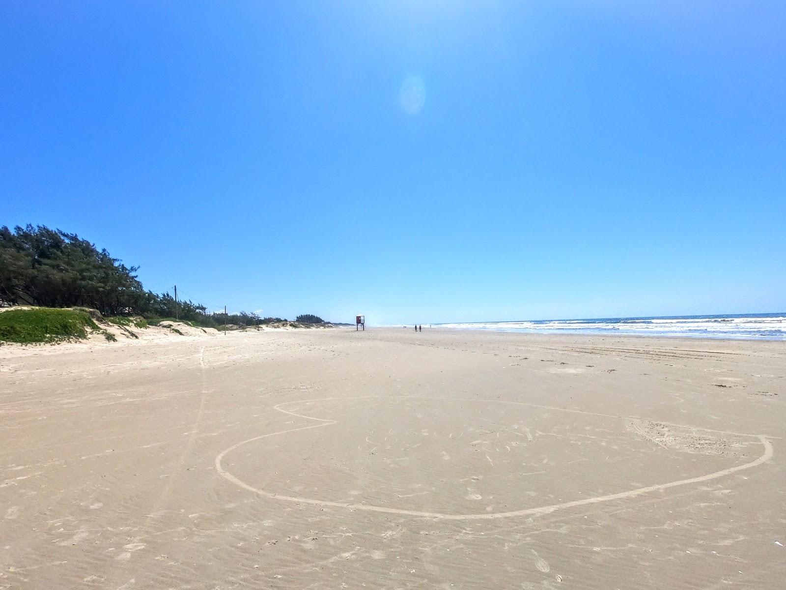 Valokuva Mariluz Norte Beachista. pinnalla turkoosi vesi:n kanssa