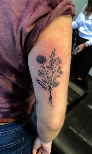Explore neck tattoo ideas for females, creative tattoo ideas in Meridian, available at Creative Pain Tattoo Studio