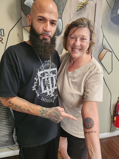 Find cardinal tattoo ideas for ladies for your next unique tattoo in Winter Haven at Angry Elephant Tattoos Winter Haven