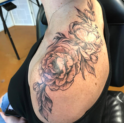 Explore fine line hand tattoo ideas, creative tattoo ideas in High Point, available at 21 Aces Tattoo Co.