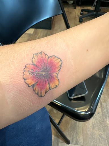 Explore tattoo ideas for neck, creative tattoo ideas in Honolulu, available at Aloha Tattoo Waikiki Hilton Hawaiian Village Rainbow Bazaar