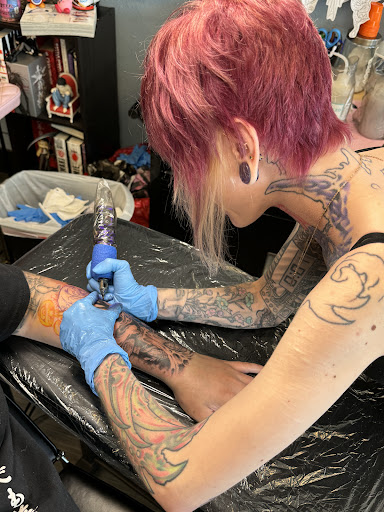 Explore ironman tattoo ideas, creative tattoo ideas in Palm Harbor, available at Angry Owl Tattoo and Piercing