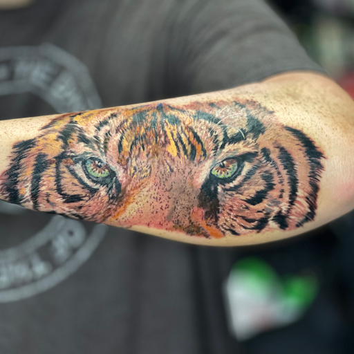 Explore chucky tattoo ideas, creative tattoo ideas in Deerfield Beach, available at Black Rose Tattoo Studio