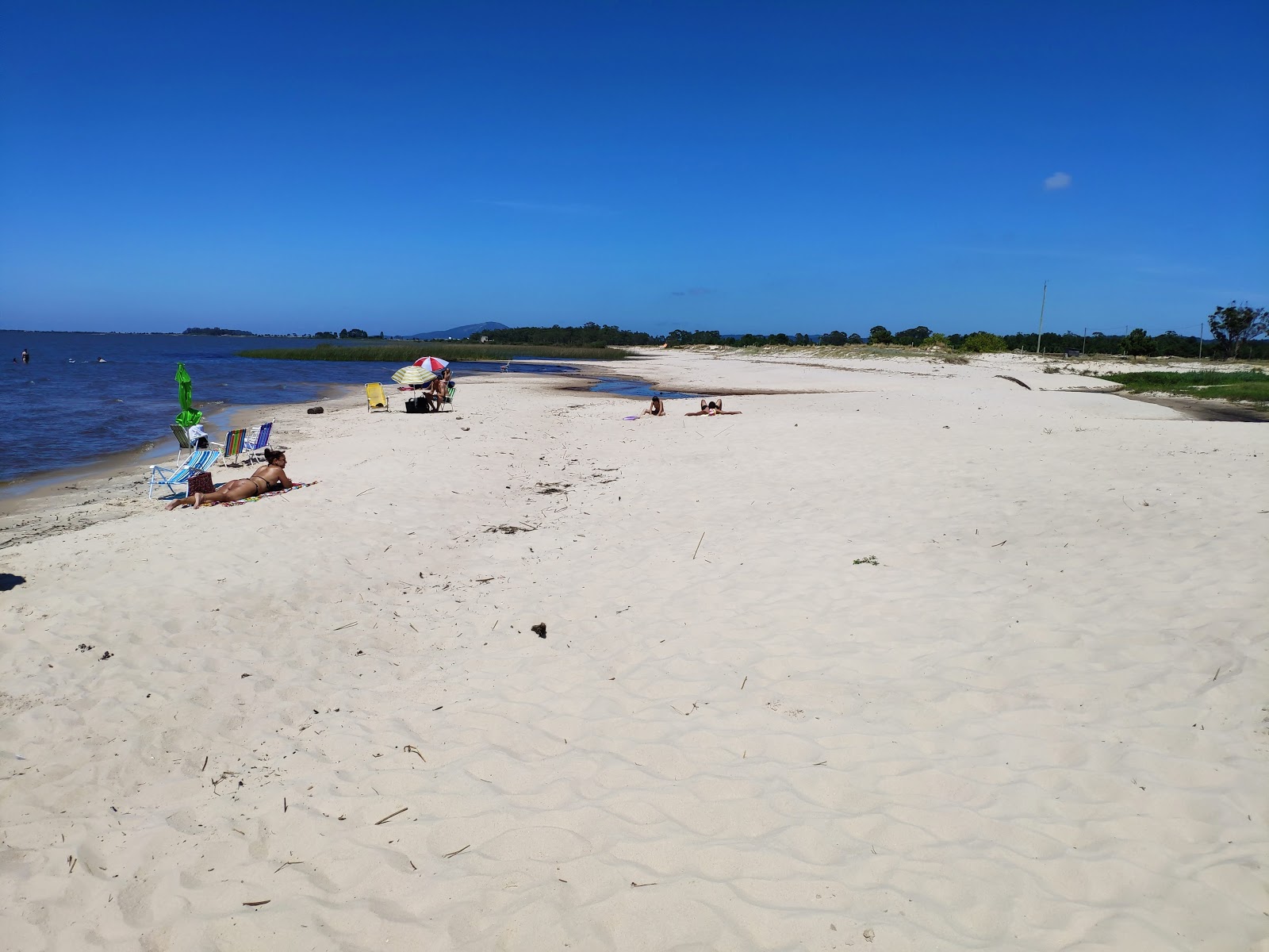Foto av Varzinha Beach med beige sand yta